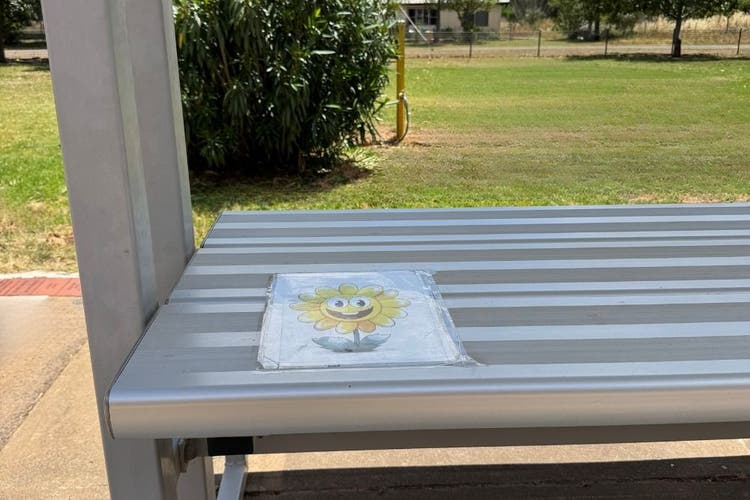 A placecard is attached to our morning tea table, this allows a student to easily recognise their designated space for this structured activity.
